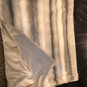 Grey and white fur blanket with grey velvet